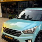 Filmshoppee technicians removing rust from Creta car body