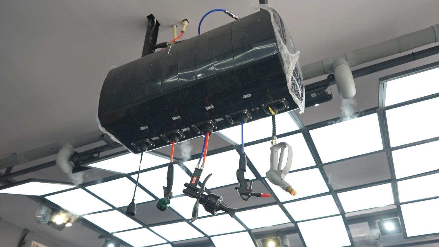 Car detailing bay with latest polishers at Filmshoppee Vadodara