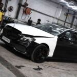 Luxury sedan before satin black car paint at Filmshoppee